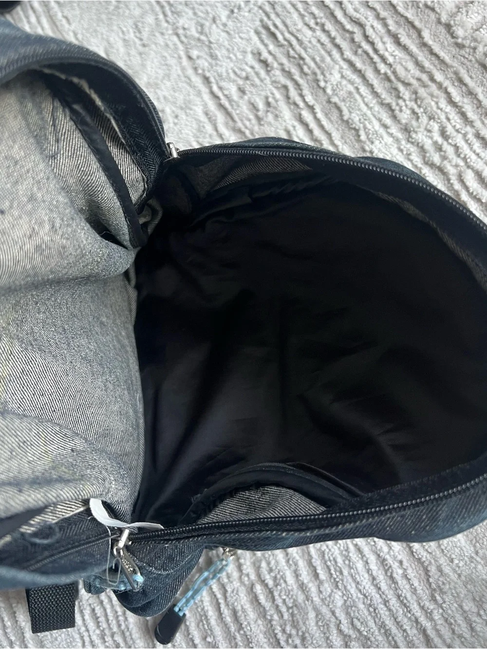 Mudd Black Backpack with Teal Handprint Accent